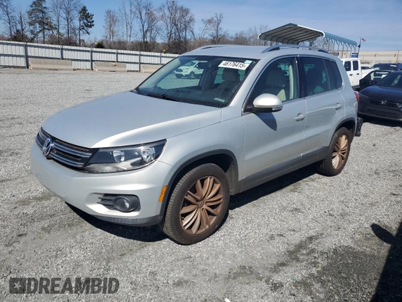 2012 Volkswagen Tiguan LE z VIN WVGAV7AX7CW525273, wystawiony jako Copart lot #46176415 z przebiegiem 155 851 mil mil oraz Czysty tytuł • Clean title. Historia ofert i sprzedaży dostępna na DreamBid. Obrazek 1.