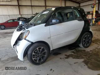 2016 Smart fortwo Passion с VIN WMEFJ5DAXGK050850, выставлен на аукционе Copart как лот 64011455 с пробегом 207 897 миль миль и Списание • Salvage title. История ставок и продаж доступна на DreamBid. Изображение 1.