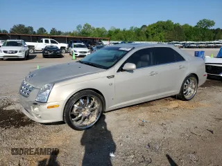 2007 Cadillac STS z VIN 1G6DW677970151227, wystawiony jako Copart lot #52345265 z przebiegiem 154 790 mil mil oraz Szkody całkowita. Historia ofert i sprzedaży dostępna na DreamBid. Obrazek 1.