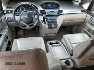 2012 Honda Odyssey Touring with VIN 5FNRL5H96CB045514, listed as a Copart auction lot 54698355 with 217,787 mi miles and Clean Title. Bid and sale history available at DreamBid. Image 8.