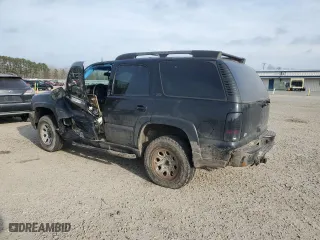 2002 Chevrolet Tahoe LT with VIN 1GNEK13Z02R285658, listed as a Copart auction lot 43216905 with 266,656 mi miles and Salvage Title. Bid and sale history available at carsss.com. Image 2.