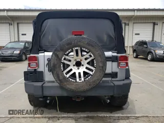2013 Jeep Wrangler Unlimited Sport z VIN 1C4BJWDG2DL685896, wystawiony jako Copart lot #53951415 z przebiegiem 142 516 mil mil oraz Tytuł czysty. Historia ofert i sprzedaży dostępna na DreamBid. Obrazek 6.