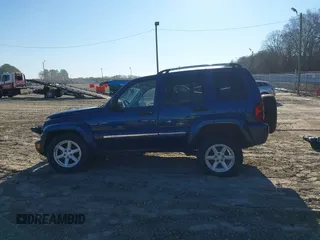 2005 Jeep Liberty Limited with VIN 1J4GK58K55W502769, listed as a IAAI auction lot 41241319 with 153,091 mi miles. Bid and sale history available at carsss.com. Image 14.