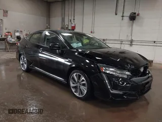 2021 Honda Clarity Touring z VIN JHMZC5F30MC000063, wystawiony jako IAAI lot #42423807 z przebiegiem 44 701 mil mil oraz . Historia ofert i sprzedaży dostępna na DreamBid. Obrazek 1.