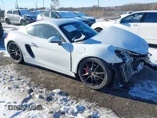2014 Porsche Cayman S with VIN WP0AB2A81EK191907, listed as a IAAI auction lot 41270319 with 59,648 mi miles and . Bid and sale history available at DreamBid. Image 1.