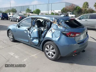 2014 Mazda 3 i Grand Touring with VIN JM1BM1M72E1201071, listed as a IAAI auction lot 42087477 with 127,111 mi miles and . Bid and sale history available at DreamBid. Image 3.