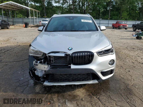 2017 BMW X1 xDrive28i z VIN WBXHT3Z34H4A53786, wystawiony jako Copart lot #54678575 z przebiegiem 86 312 mil mil oraz Szkoda całkowita • Salvage title. Historia ofert i sprzedaży dostępna na DreamBid. Obrazek 5.
