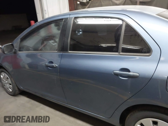 2010 Toyota Yaris with VIN JTDBT4K35A4068691, listed as a IAAI auction lot 42057726 with 108,053 mi miles. Bid and sale history available at carsss.com. Image 14.