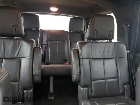 2014 Lincoln Navigator z VIN 5LMJJ2J57EEL02363, wystawiony jako Copart lot #54657415 z przebiegiem 245 326 mil mil oraz Czysty tytuł • Clean title. Historia ofert i sprzedaży dostępna na DreamBid. Obrazek 10.