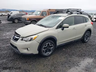 2015 Subaru XV Crosstrek Premium with VIN JF2GPACC1F8233614, listed as a IAAI auction lot 41788304 with 107,781 mi miles. Bid and sale history available at carsss.com. Image 2.
