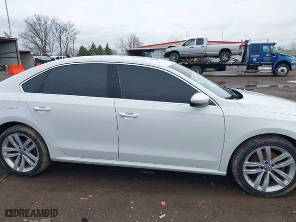 2018 Volkswagen Passat 2.0T SE with VIN 1VWBA7A35JC018885, listed as a IAAI auction lot 41955324 with 107,046 mi miles. Bid and sale history available at carsss.com. Image 13.
