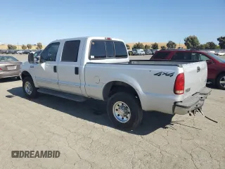 2002 Ford F-250 XL with VIN 1FTNW21L92ED10310, listed as a Copart auction lot 59132935 with 217,885 mi miles and Salvage title. Bid and sale history available at DreamBid. Image 2.