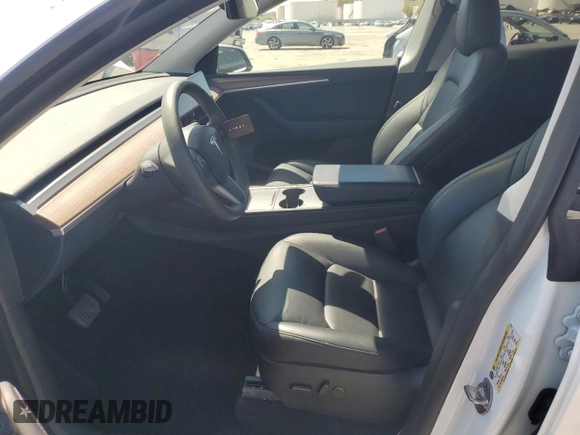 2024 Tesla Model Y Long Range с VIN 7SAYGDEE6RF157415, выставлен на аукционе Copart как лот 54950915 с пробегом 20 567 миль миль и Списание • Salvage title. История ставок и продаж доступна на DreamBid. Изображение 7.