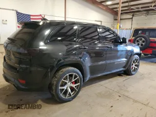 2017 Jeep Grand Cherokee SRT with VIN 1C4RJFDJ1HC760023, listed as a Copart auction lot 45227385 with 95,135 mi miles and Salvage Title. Bid and sale history available at carsss.com. Image 3.