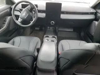2023 Ford Mustang Mach-E Premium with VIN 3FMTK3SU7PMA32536, listed as a Copart auction lot 47408665 with 16,978 mi miles and Salvage Title. Bid and sale history available at DreamBid. Image 8.