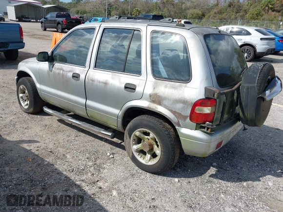2001 Kia Sportage with VIN KNDJB723115706221, listed as a IAAI auction lot 41562713 with 99,378 mi miles. Bid and sale history available at carsss.com. Image 3.