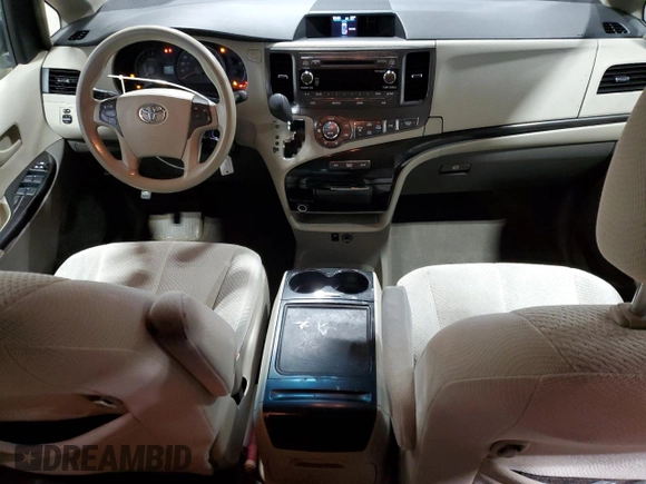 2014 Toyota Sienna LE with VIN 5TDJK3DC9ES083307, listed as a Copart auction lot 57939385 with 132,494 mi miles and Salvage title. Bid and sale history available at DreamBid. Image 8.