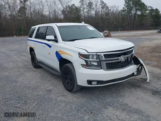 2018 Chevrolet Tahoe Commercial with VIN 1GNLCDEC0JR223125, listed as a IAAI auction lot 41540653 with 147,995 mi miles. Bid and sale history available at carsss.com. Image 1.