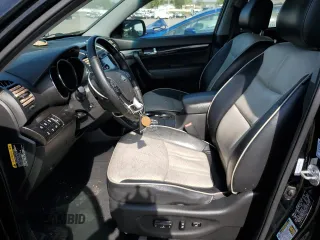 2012 Kia Sorento SX with VIN 5XYKWDA24CG231819, listed as a Copart auction lot 54662245 with 186,149 mi miles and Clean Title. Bid and sale history available at carsss.com. Image 7.