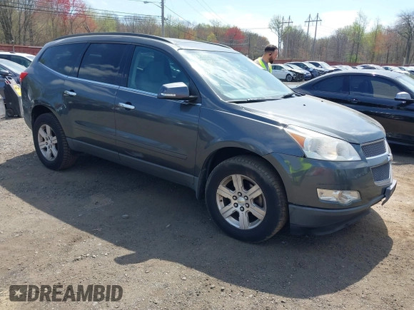 2011 Chevrolet Traverse 1LT z VIN 1GNKRGED1BJ359820, wystawiony jako IAAI lot #42095000 z przebiegiem 80 117 mil mil oraz . Historia ofert i sprzedaży dostępna na DreamBid. Obrazek 1.