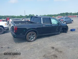 2023 Honda Ridgeline RTL-E with VIN 5FPYK3F71PB022739, listed as a IAAI auction lot 42447428 with 19,702 mi miles and . Bid and sale history available at DreamBid. Image 4.