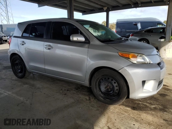 2012 Scion xD with VIN JTKKU4B45C1023933, listed as a Copart auction lot 49886585 with 206,421 mi miles and Salvage Title. Bid and sale history available at DreamBid. Image 4.