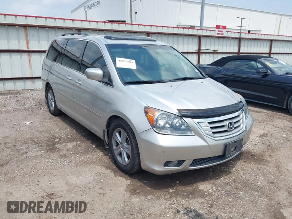 2009 Honda Odyssey Touring z VIN 5FNRL38949B002092, wystawiony jako IAAI lot #42072003 z przebiegiem Nie podano mil oraz . Historia ofert i sprzedaży dostępna na DreamBid. Obrazek 1.
