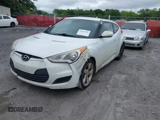 2013 Hyundai Veloster w/Black Int с VIN KMHTC6AD9DU155259, выставлен на аукционе IAAI как лот 42361365 с пробегом 261 896 миль миль и . История ставок и продаж доступна на DreamBid. Изображение 2.