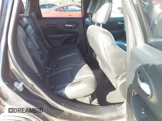 2016 Jeep Cherokee Limited with VIN 1C4PJLDS7GW159825, listed as a IAAI auction lot 41951609 with 102,624 mi miles and . Bid and sale history available at DreamBid. Image 8.