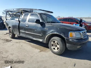 1999 Ford F-150 с VIN 2FTZX1729XCA25031, выставлен на аукционе Copart как лот 46941615 с пробегом 310 800 миль миль и Списание • Salvage title. История ставок и продаж доступна на DreamBid. Изображение 4.