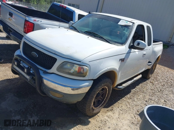 2002 Ford F-150 XL with VIN 1FTRX08L12KB49882, listed as a IAAI auction lot 42121639 with Not provided miles and . Bid and sale history available at DreamBid. Image 2.