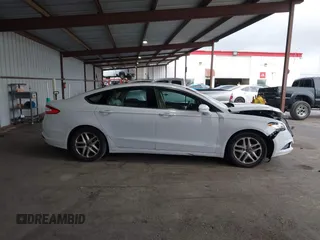 2016 Ford Fusion SE with VIN 3FA6P0H71GR386404, listed as a IAAI auction lot 41974062 with 104,018 mi miles. Bid and sale history available at carsss.com. Image 14.