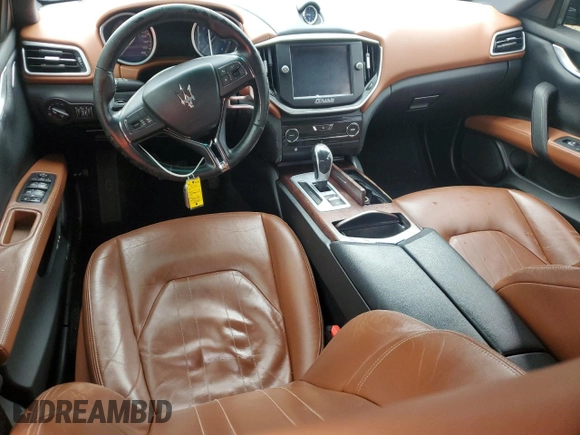 2016 Maserati Ghibli S with VIN ZAM57RSA9G1168795, listed as a Copart auction lot 56145895 with 77,864 mi miles and Salvage title. Bid and sale history available at DreamBid. Image 8.