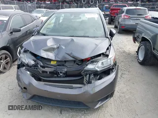 2016 Honda Fit LX with VIN JHMGK5H58GX034743, listed as a IAAI auction lot 42113760 with 98,283 mi miles and . Bid and sale history available at DreamBid. Image 12.