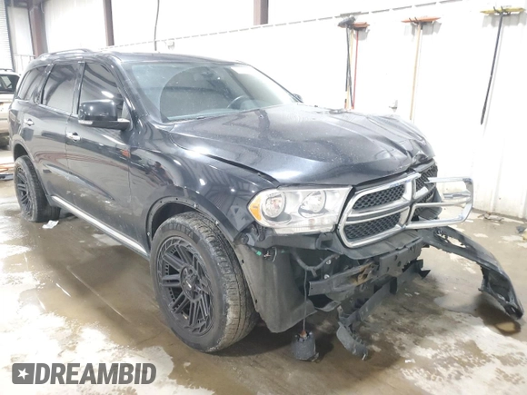 2013 Dodge Durango Crew with VIN 1C4SDJDT8DC509541, listed as a Copart auction lot 54063395 with 145,471 mi miles and Salvage title. Bid and sale history available at DreamBid. Image 4.
