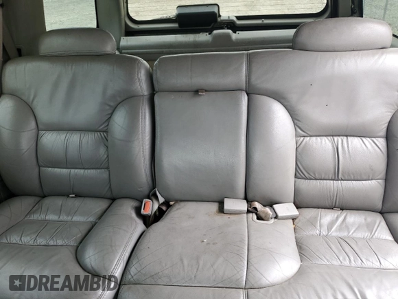 1999 Chevrolet Tahoe Z71 with VIN 1GNEK13R6XJ301562, listed as a Copart auction lot 59684595 with 200,561 mi miles and Salvage title. Bid and sale history available at DreamBid. Image 10.