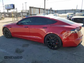 2021 Tesla Model S Plaid с VIN 5YJSA1E69MF446924, выставлен на аукционе Copart как лот 87644725 с пробегом 2 530 миль миль и Списание • Salvage title. История ставок и продаж доступна на DreamBid. Изображение 2.