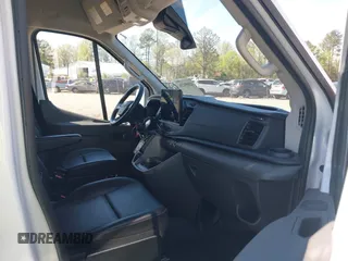 2022 Ford Transit Cargo with VIN 1FTBW3X80NKA69156, listed as a IAAI auction lot 42059236 with 100,096 mi miles and . Bid and sale history available at DreamBid. Image 5.