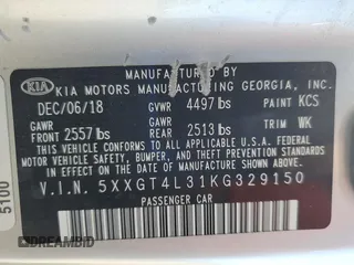 2019 Kia Optima LX z VIN 5XXGT4L31KG329150, wystawiony jako Copart lot #59225935 z przebiegiem 58 253 mil mil oraz Szkoda całkowita • Salvage title. Historia ofert i sprzedaży dostępna na DreamBid. Obrazek 13.