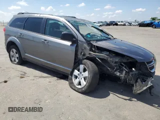 2013 Dodge Journey SE с VIN 3C4PDCAB9DT656887, выставлен на аукционе Copart как лот 54791315 с пробегом 130 394 миль миль и Списание • Salvage title. История ставок и продаж доступна на DreamBid. Изображение 4.