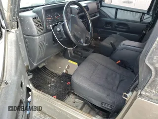 2003 Jeep Wrangler X с VIN 1J4FA39S03P349713, выставлен на аукционе Copart как лот 55768995 с пробегом 187 266 миль миль и Списание • Salvage title. История ставок и продаж доступна на DreamBid. Изображение 8.