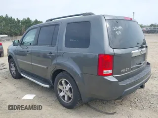 2010 Honda Pilot Touring z VIN 5FNYF4H83AB010432, wystawiony jako IAAI lot #42125885 z przebiegiem 172 516 mil mil oraz . Historia ofert i sprzedaży dostępna na DreamBid. Obrazek 3.