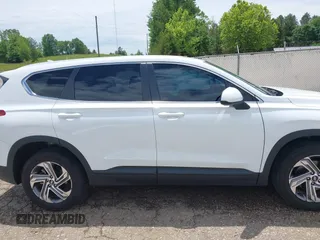 2023 Hyundai Santa Fe SE with VIN 5NMS14AJ9PH630176, listed as a IAAI auction lot 42202536 with 26,624 mi miles and . Bid and sale history available at DreamBid. Image 14.