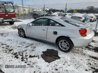 2000 Toyota Celica GT with VIN JTDDR32TXY0020977, listed as a Copart auction lot 86059314 with 249,829 mi miles and Salvage Title. Bid and sale history available at carsss.com. Image 2.