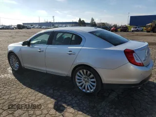 2014 Lincoln MKS with VIN 1LNHL9EK5EG606901, listed as a Copart auction lot 75300803 with 98,694 mi miles and Clean Title. Bid and sale history available at DreamBid. Image 2.