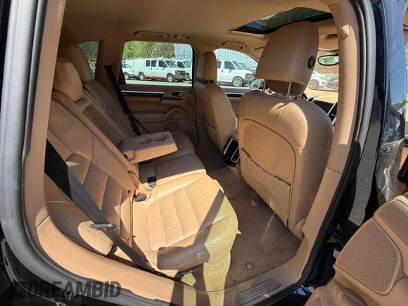 2012 Porsche Cayenne S Hybrid z VIN WP1AE2A28CLA94048, wystawiony jako Copart lot #56879555 z przebiegiem 129 448 mil mil oraz Tytuł czysty. Historia ofert i sprzedaży dostępna na DreamBid. Obrazek 6.