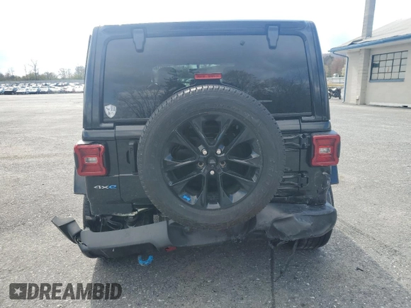 2023 Jeep Wrangler Sahara z VIN 1C4JJXP67PW513595, wystawiony jako Copart lot #53482175 z przebiegiem 30 943 mil mil oraz Szkoda całkowita • Salvage title. Historia ofert i sprzedaży dostępna na DreamBid. Obrazek 6.