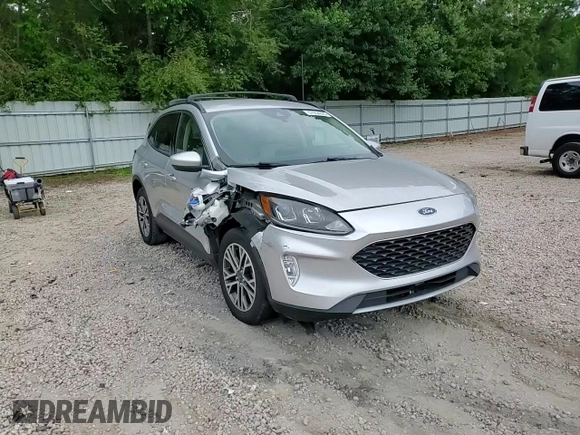2020 Ford Escape SEL z VIN 1FMCU9H66LUB44403, wystawiony jako Copart lot #57934925 z przebiegiem Nie podano mil oraz Szkoda całkowita • Salvage title. Historia ofert i sprzedaży dostępna na DreamBid. Obrazek 14.