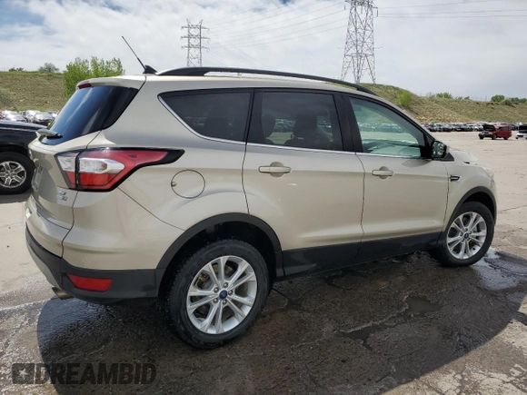 2018 Ford Escape SE z VIN 1FMCU9GD5JUC08024, wystawiony jako Copart lot #56531105 z przebiegiem 54 104 mil mil oraz Szkoda całkowita • Salvage title. Historia ofert i sprzedaży dostępna na DreamBid. Obrazek 3.