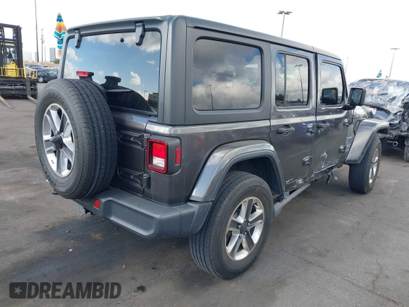2021 Jeep Wrangler Unlimited Sahara with VIN 1C4HJXEN4MW503014, listed as a IAAI auction lot 41900234 with 16,444 mi miles and . Bid and sale history available at DreamBid. Image 4.